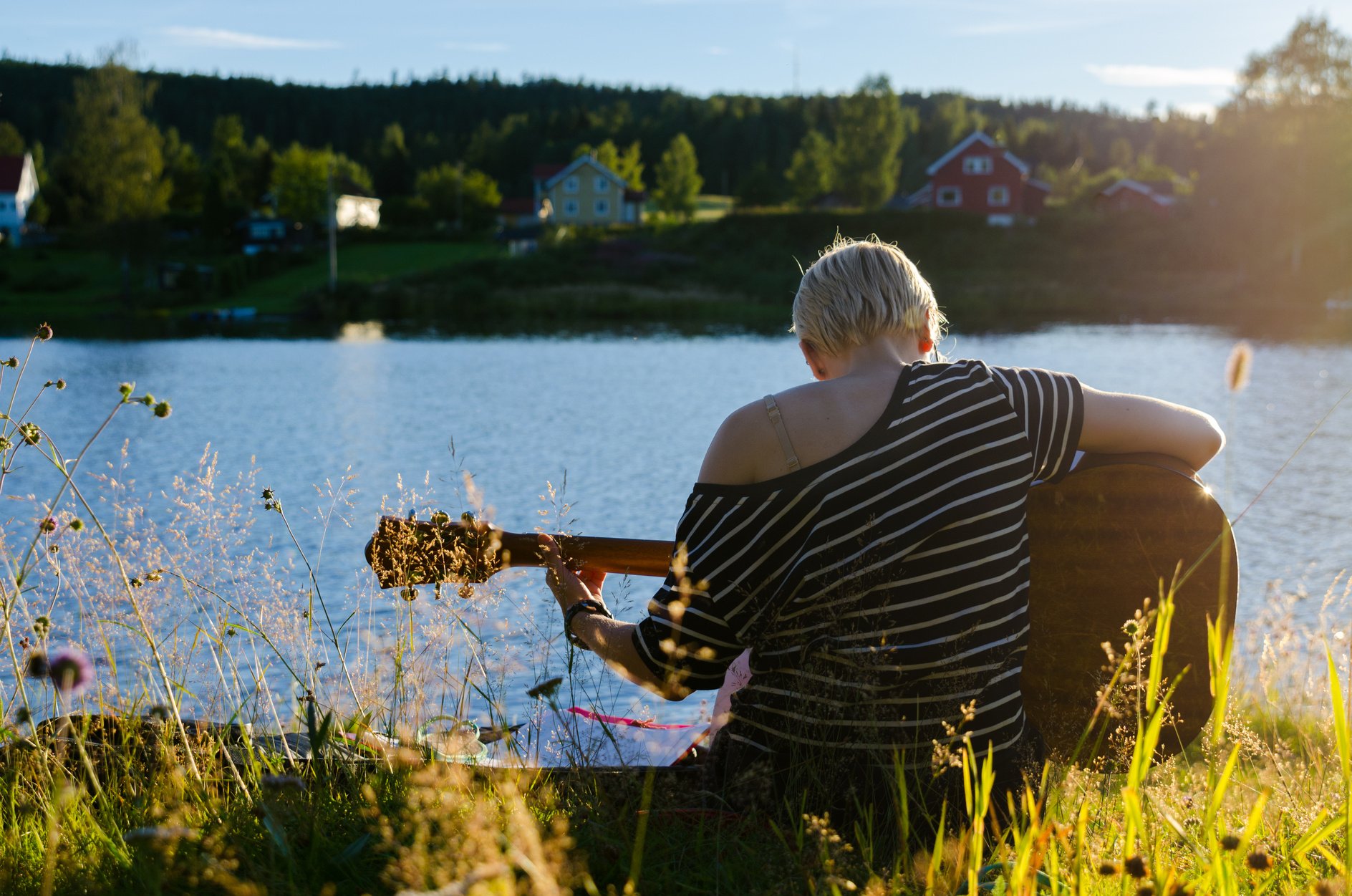 Woman Playing Guitar